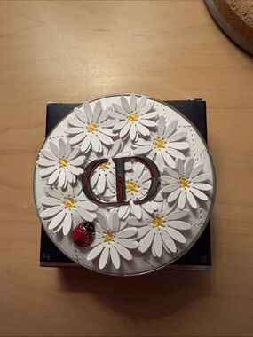 Dior White Daisy Compact with Yellow Centers and Red Ladybug
